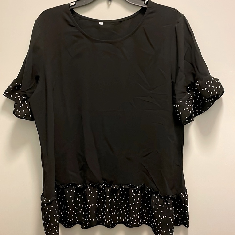Summer top for work or going out.Never worn.